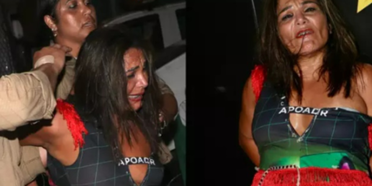 mulher-e-presa-no-sambodromo-por-morder-gente-em-camarote