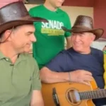 de-chapeu-sertanejo,-flavio-bolsonaro-almoca-com-amado-batista-em-goias